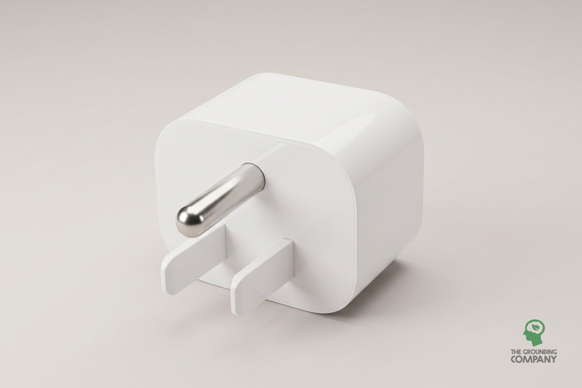 USA earth adapter, front view showing grounding pin and prongs