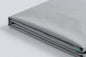 The Grounding Half Sheet folded into a compact stack, showing its grey woven texture and finished edge.