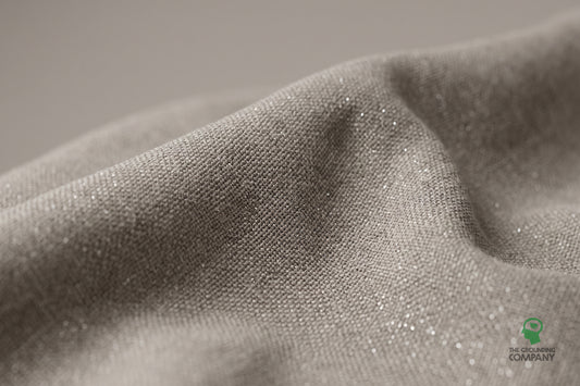 Close-up of the fabric's woven texture and subtle silver sheen