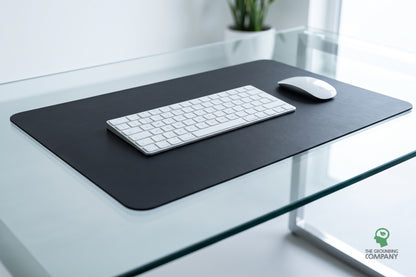 Grounding PU Foot Mat on a glass desk with a keyboard and mouse resting on it