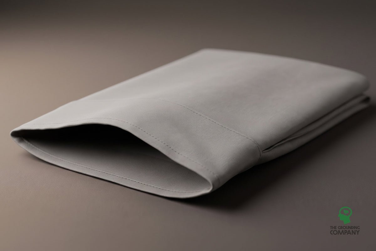 Close-up of the pillowcase's stitched seam and envelope opening